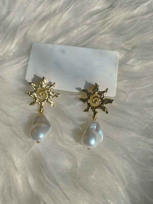 Boucle d’oreille soleil  avec pendentif